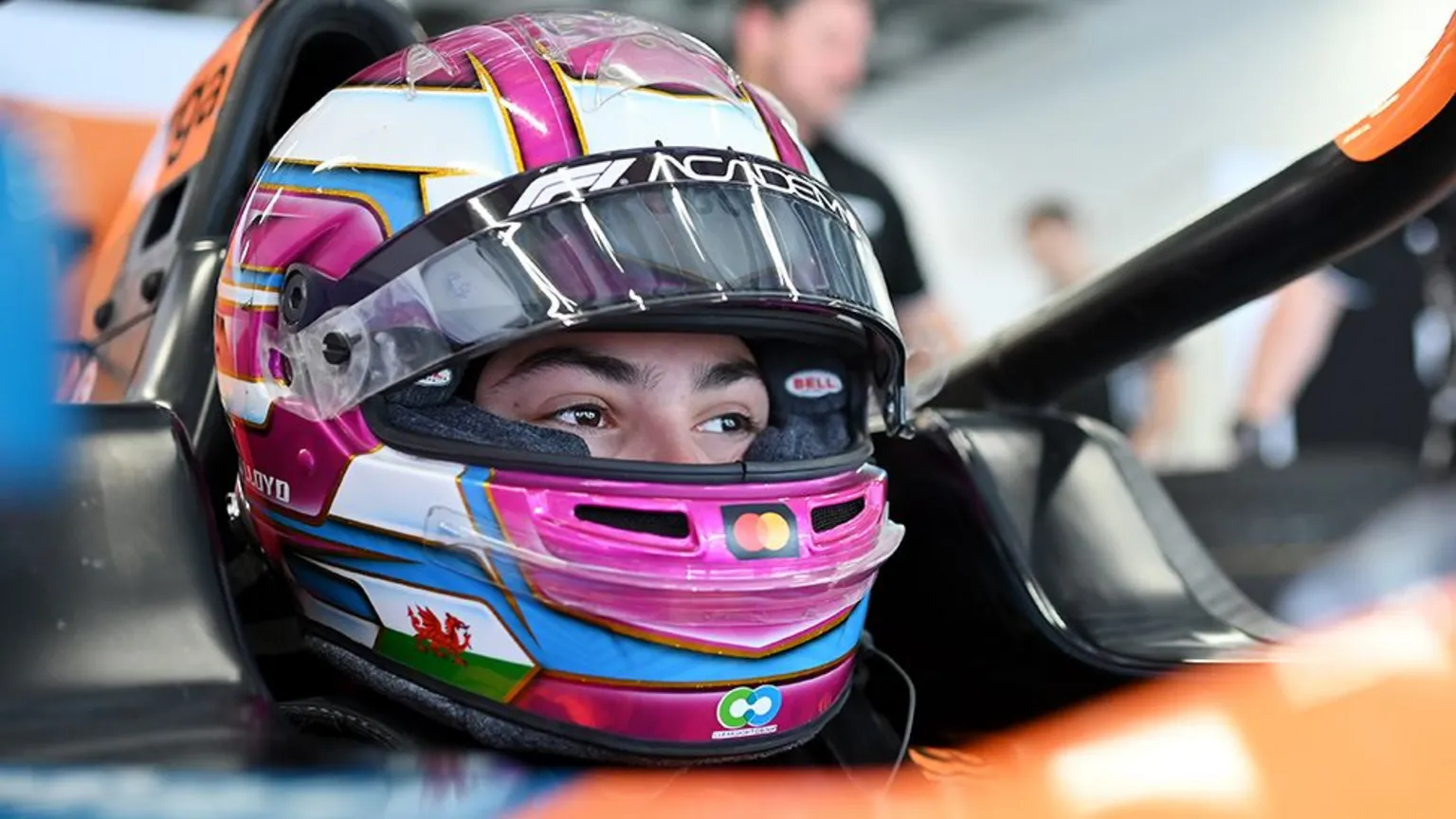 Getty Images A close up shot of Ella Lloyd's helmet, which is white at the top, with a visor and the Wales flag on the bottom left of the helmet.