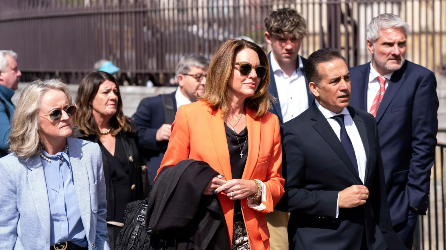 PA Media Parents arriving at an inquiry 